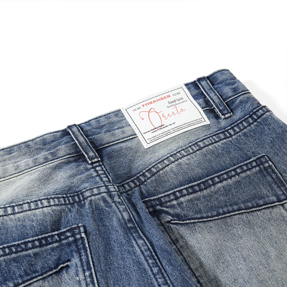 Grinding white distressed denim bell bottoms