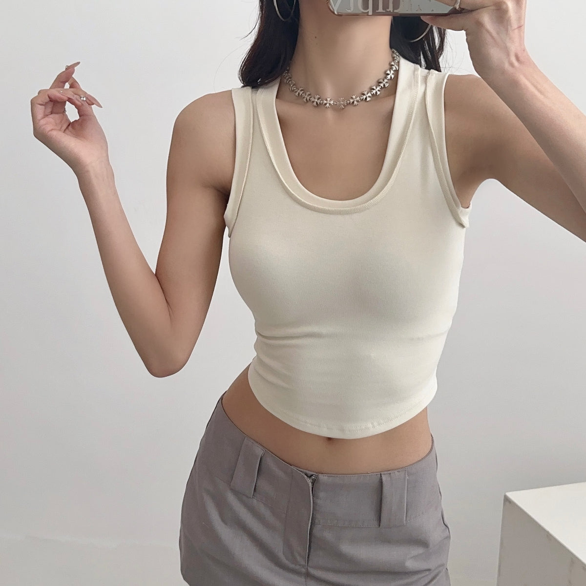 U-neck women wearing small tank tops